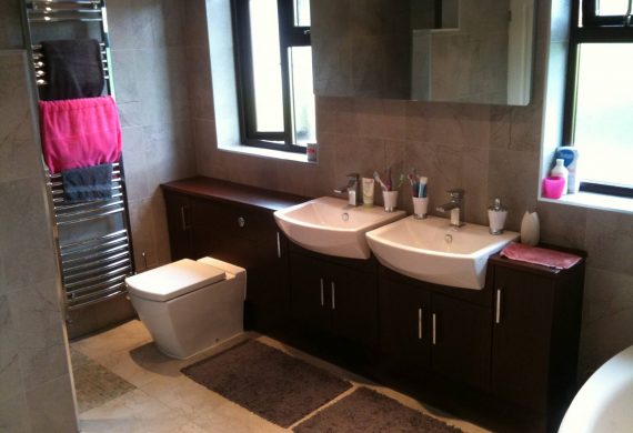 Twin sink in designed bathroom