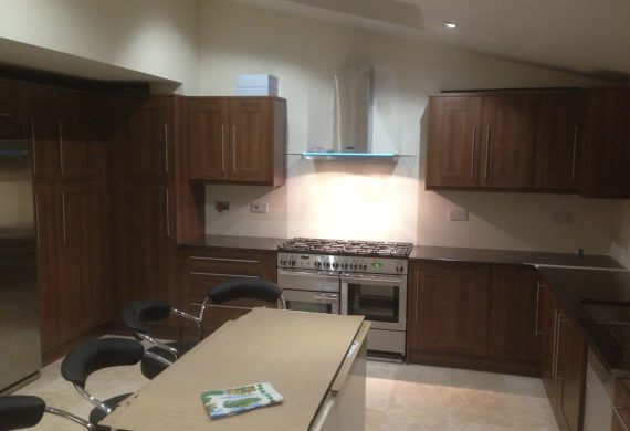 Kitchen cupboards, new range and extractor