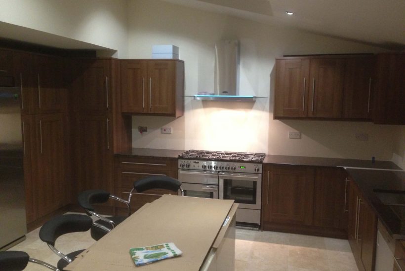 Kitchen cupboards, new range and extractor